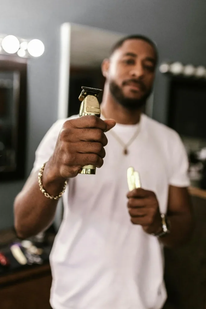 Man holding a premium beard trimmer