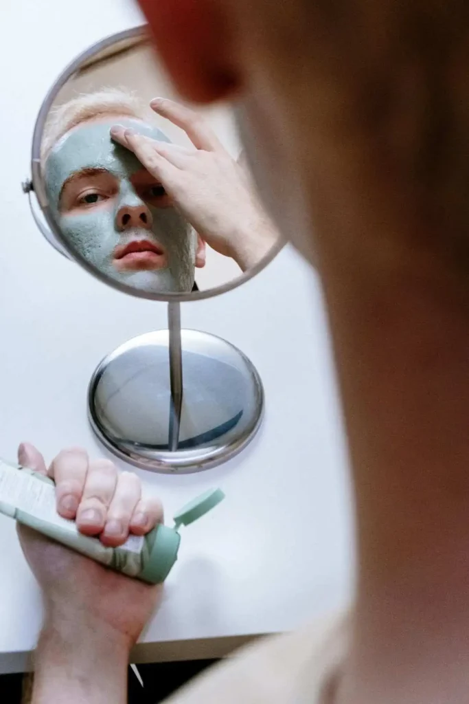 Man applying face mask