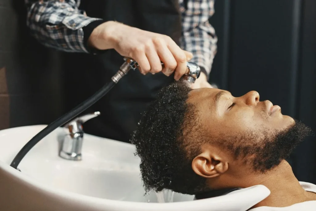 Man relaxing in hair spa