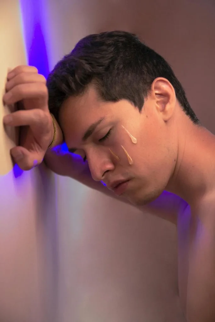 Man applying gentle face wash for sensitive skin hydration